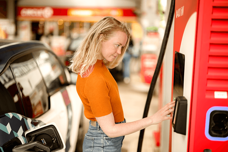 Woman following charging instructions